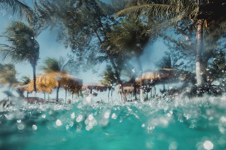 Outdoor pool, free cabanas, pool umbrellas. Pousada Recanto da Praia