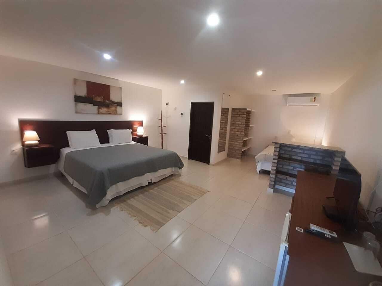 Habitación triple Deluxe | Minibar, decoración personalizada y muebles diferentes 