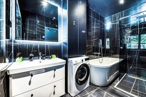 Hair dryer, bathrobes, slippers, towels