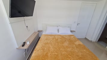 Apartamento | Wi-Fi de cortesia, roupa de cama