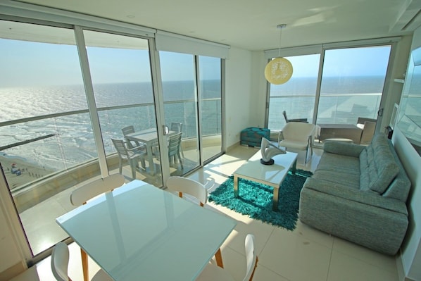 Exclusive Apartment | Living room | 32-inch flat-screen TV with cable channels, TV