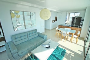 Exclusive Apartment | Living room | 32-inch flat-screen TV with cable channels, TV