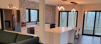 Stunning modern cabin high on a ridge with sunrise and sunset views!