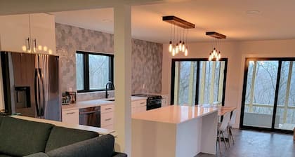 Stunning modern cabin high on a ridge with sunrise and sunset views!