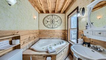 Jetted bath, hair dryer, towels, soap