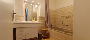Bathtub, hair dryer