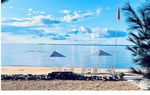 On the beach, sun-loungers, beach towels