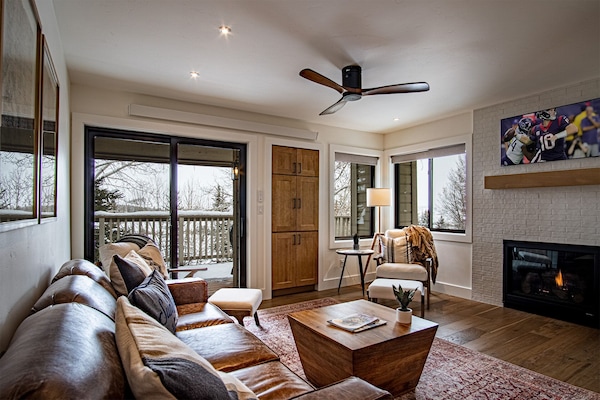 Warm, Comfortable Living Room with HDR TV and Gas Fireplace