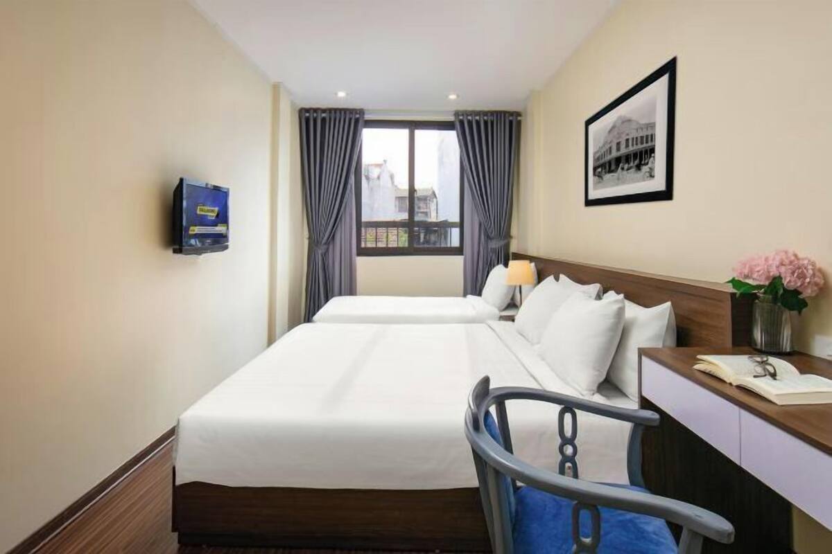 Desk, blackout drapes, iron/ironing board, free WiFi
