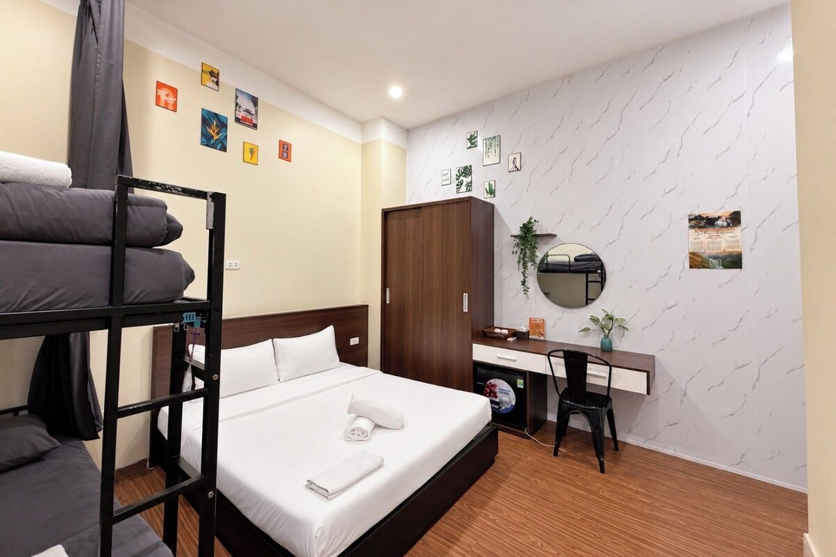 Deluxe Quadruple Room | Premium bedding, pillowtop beds, desk, laptop workspace