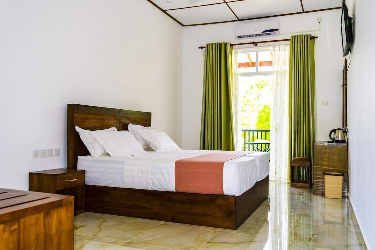 Quarto luxo | Frigobar, Wi-Fi de cortesia, roupa de cama
