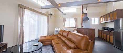 Villa | Living area | 59-inch flat-screen TV with digital channels, TV