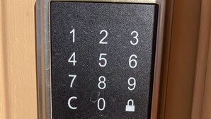 A numeric keypad lock with a keyhole below it. - Private access, private room, private bathroom (Goodyear)