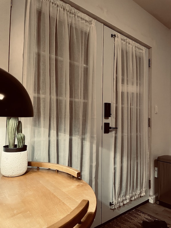 The apartment's front door by night.