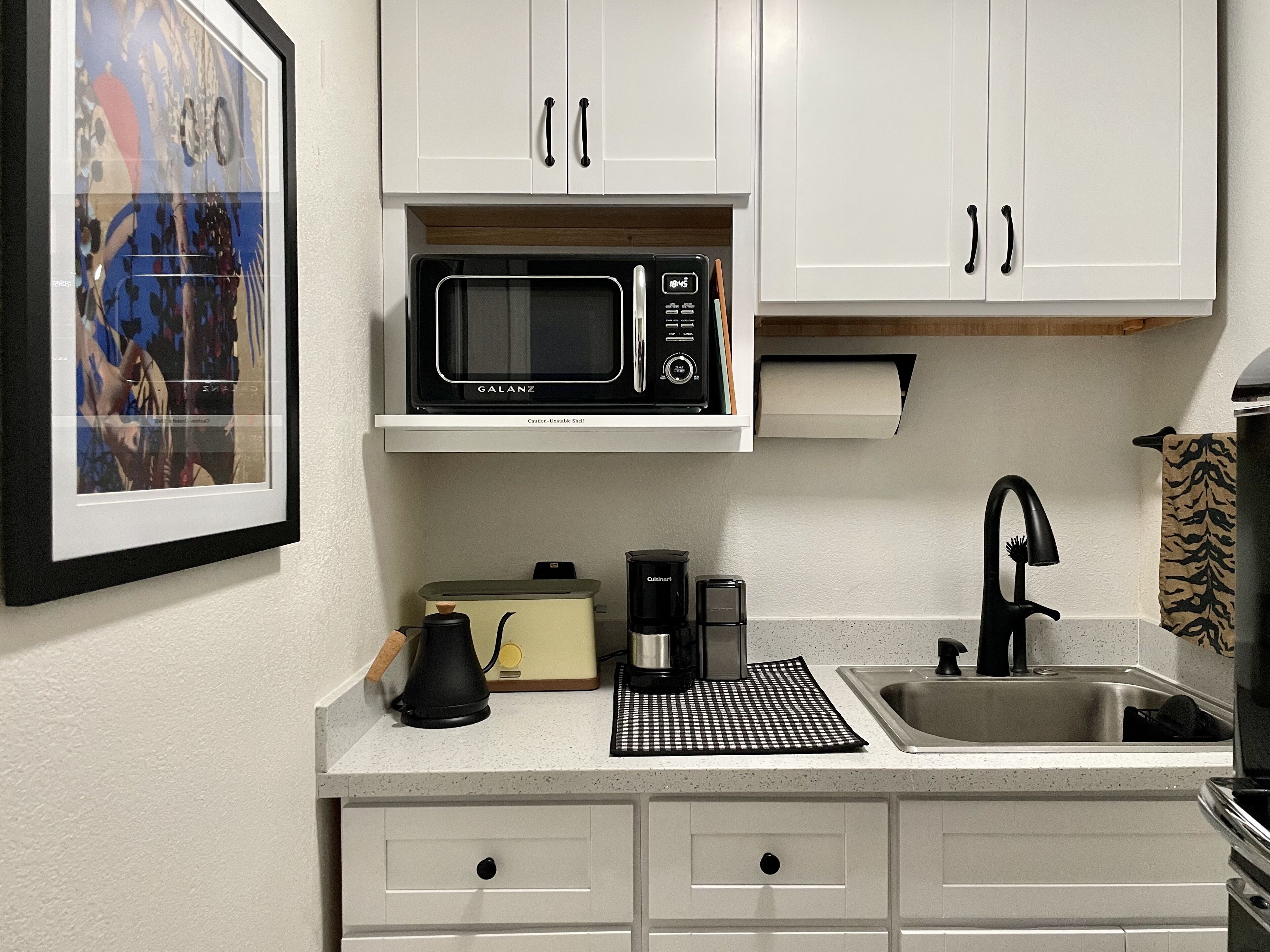Small & mighty — while well-appointed, this is a kitchenette, not a full kitchen