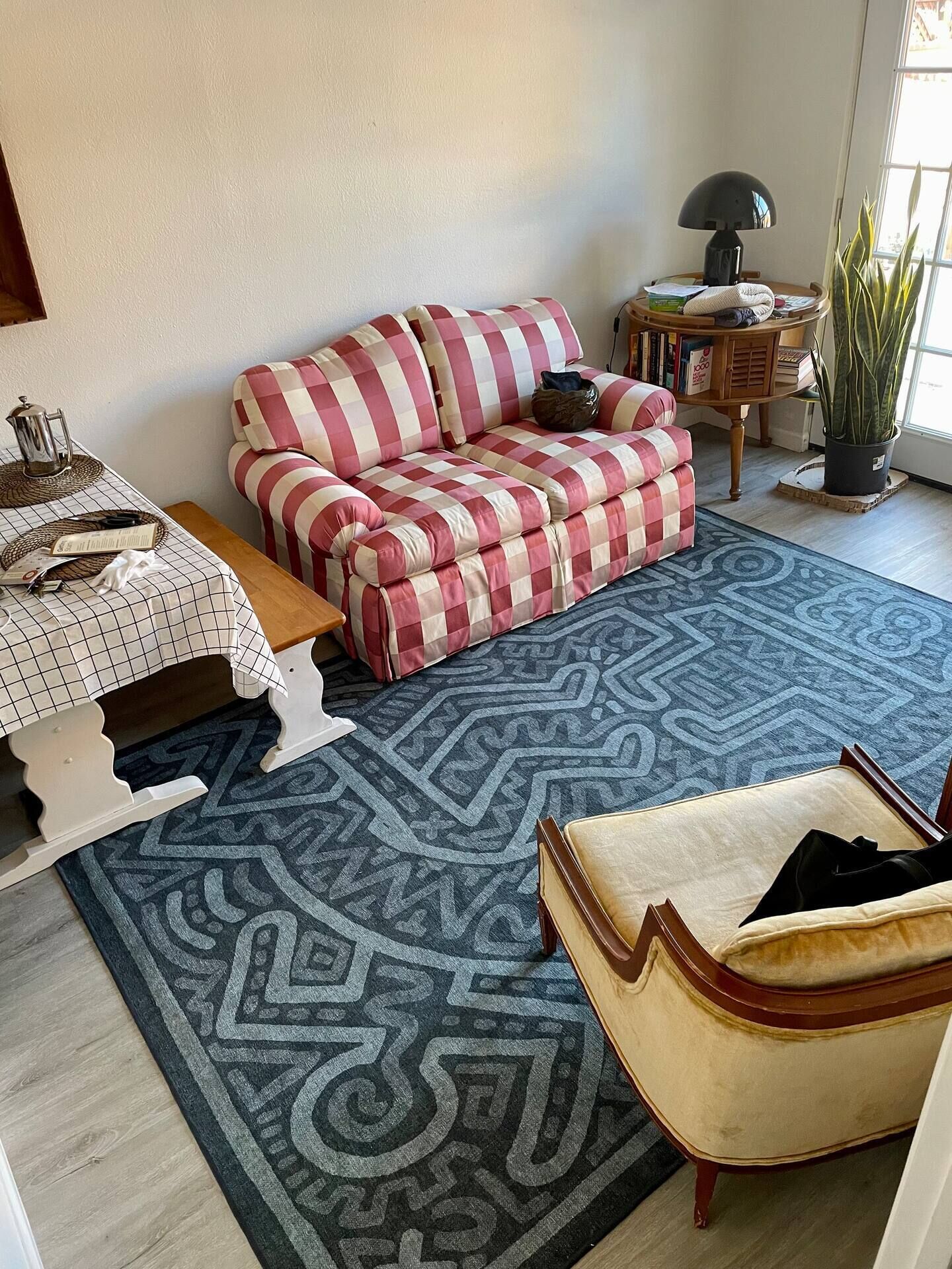 Birdseye view of the suite's entry, dining and sitting areas.