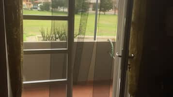 Chambre Quadruple Deluxe, 1 chambre, non-fumeur, vue jardin | Vue depuis le balcon