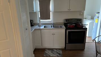 Cottage, 1 Bedroom | Private kitchen | Fridge, oven, coffee/tea maker, toaster