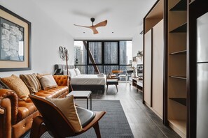 Exclusive Studio Suite, 1 King Bed, Non Smoking, City View | Living area | 49-inch Smart TV with digital channels, TV, fireplace - Scarletz KLCC Apartments By Soulasia (Kuala Lumpur)