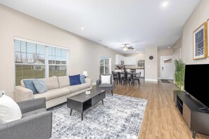 TV, offices - Stylish New Build! 2BR Condo w/ Patio & Garage (Wyoming)