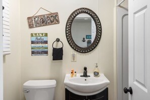 Shower, hair dryer, towels, shampoo