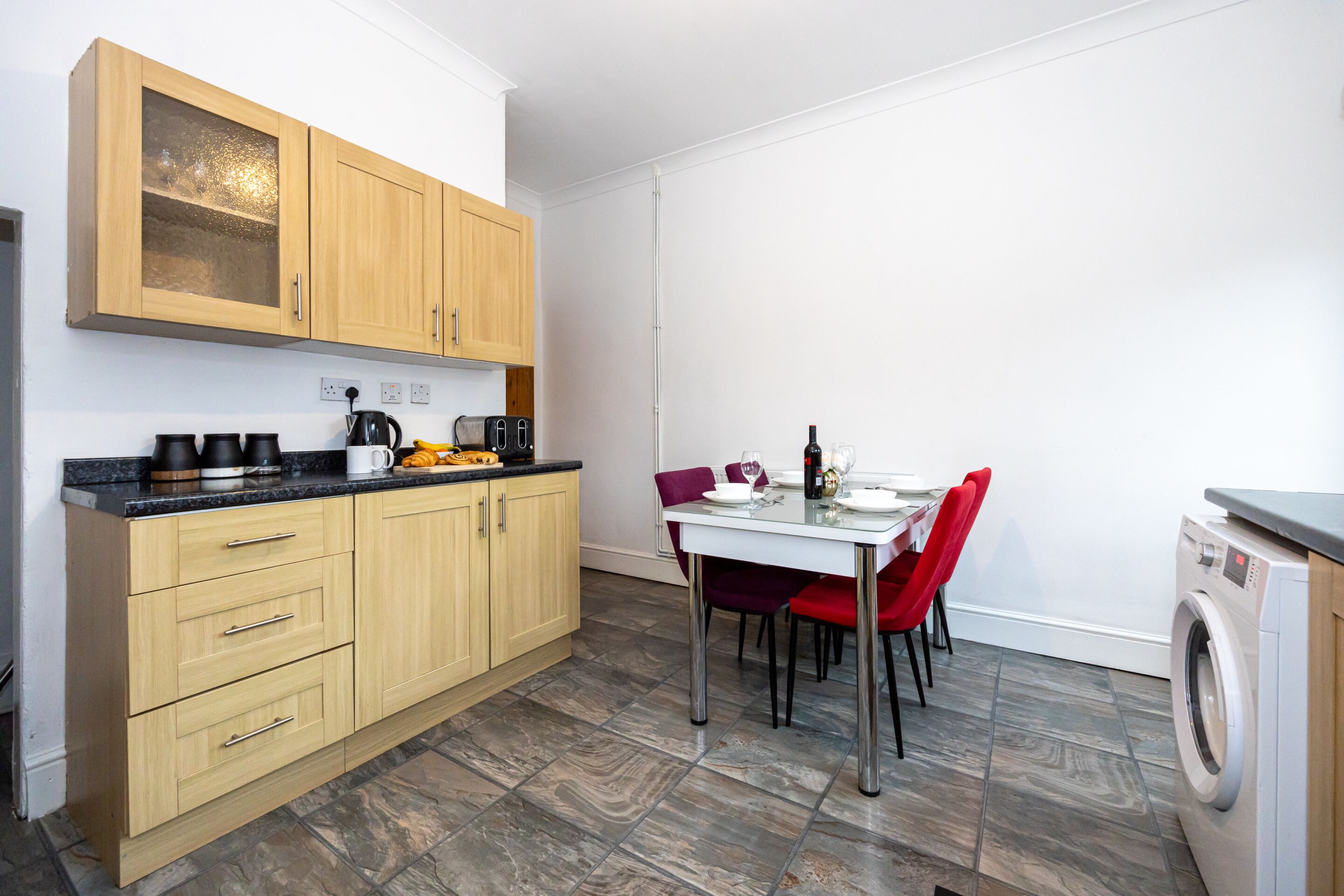 Coffee/tea maker, fridge, microwave, oven