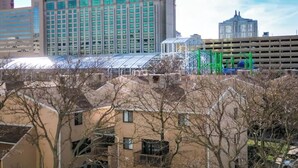 A hotel with a large sign reading "SHOWBOAT" and a modern glass facade.