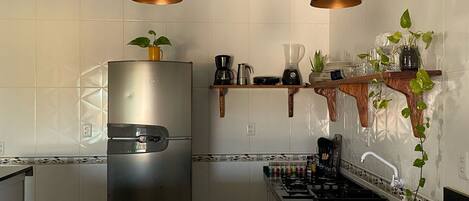 Fridge, stovetop, coffee/tea maker, toaster