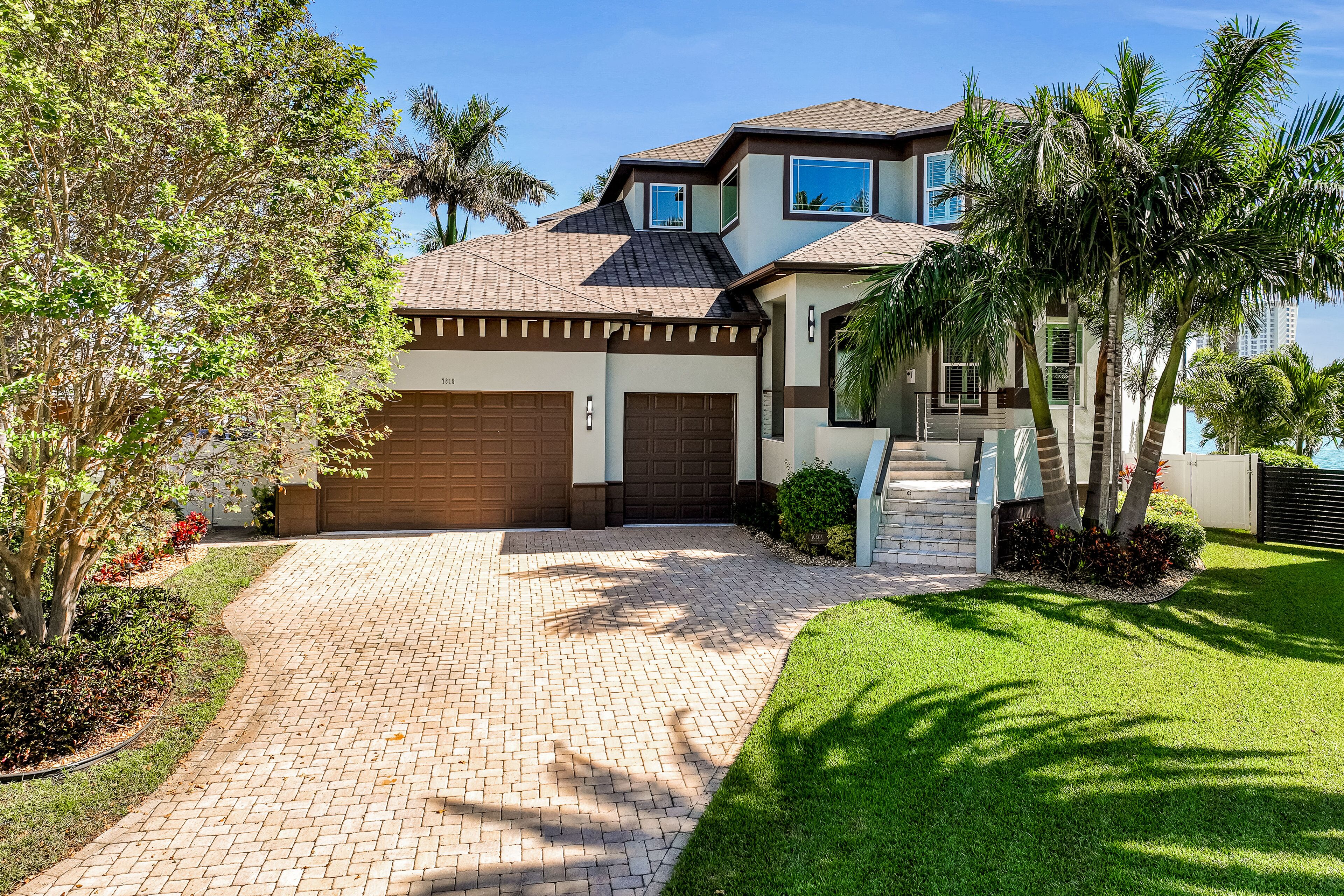 Luxe waterfront home with amazing views, pool, spa, dock, covered patio & grill