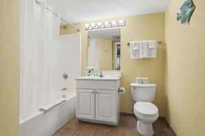 Combined shower/tub, hair dryer, towels, shampoo