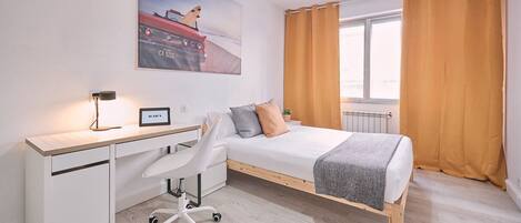 Economy Double Room | Down comforters, individually decorated, individually furnished, desk