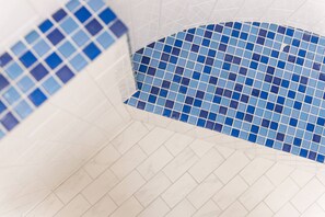A tiled floor with a pattern of blue and white tiles. - Fresh, Clean, Relaxing Home, in the Heart of North County San Diego (San Marcos)