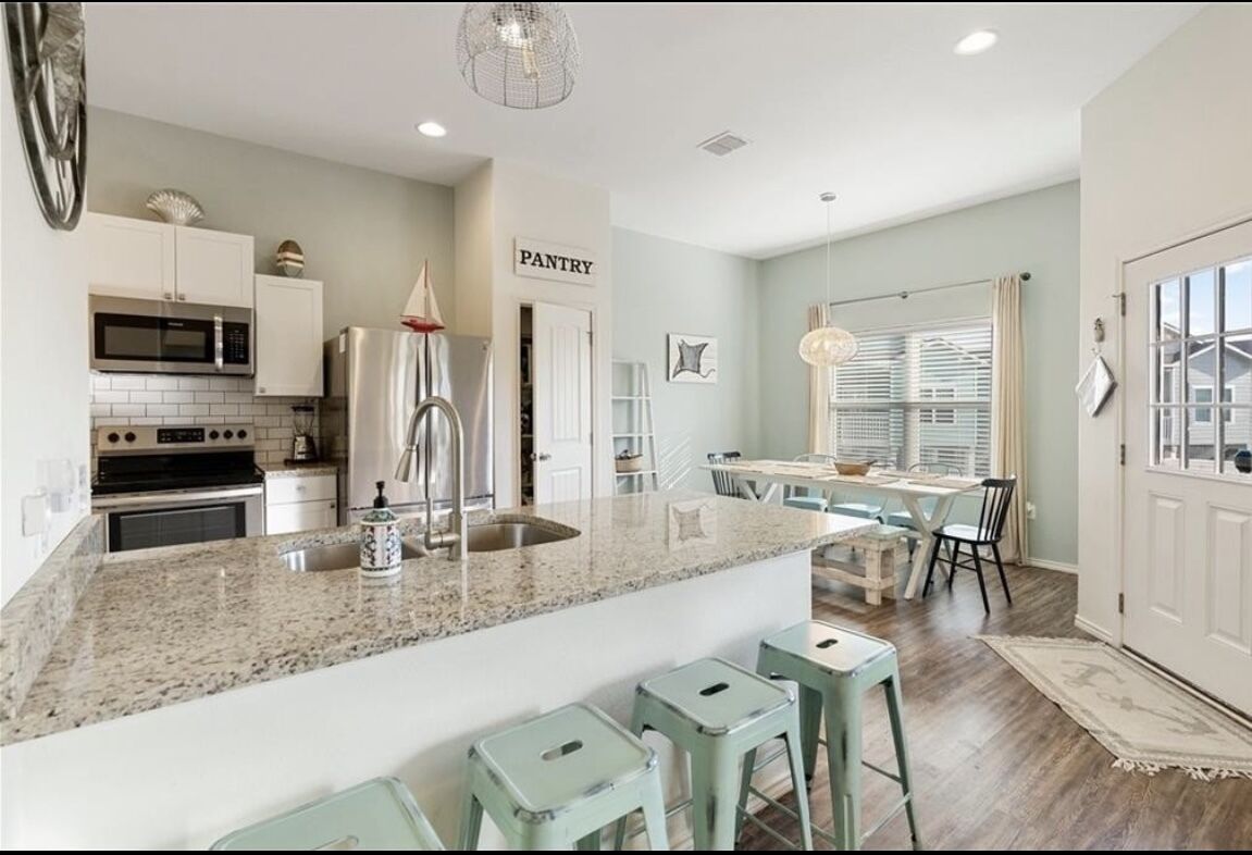 Fun/ family pack coastal home with ocean bay view on upper deck.