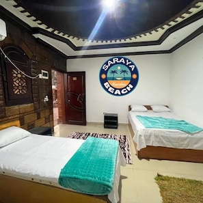 Premium bedding, pillow-top beds, desk, free rollaway beds