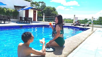 Outdoor pool, open 8:00 AM to 11:00 PM, pool umbrellas, pool loungers