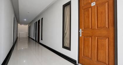 OYO Life 90606 Glass House Citraland Syariah