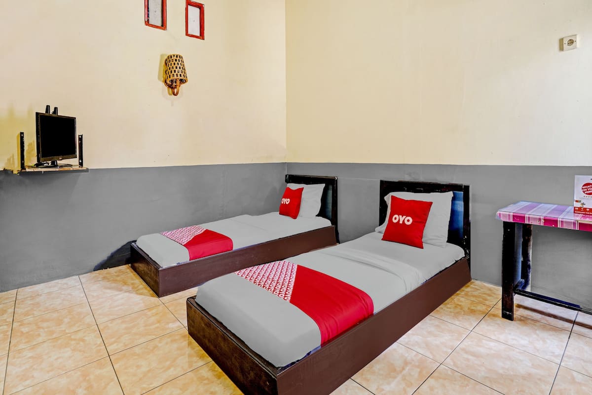 Kamar Twin Standar | 1 kamar tidur, ruang kerja ramah laptop, Wi-Fi gratis, dan seprai linen