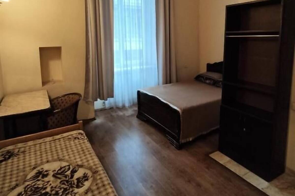 Habitación triple | Área de sala de estar