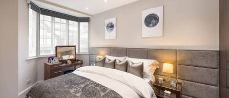 1 bedroom, desk, iron/ironing board, travel crib