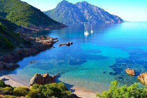 On the beach, sun loungers, beach towels