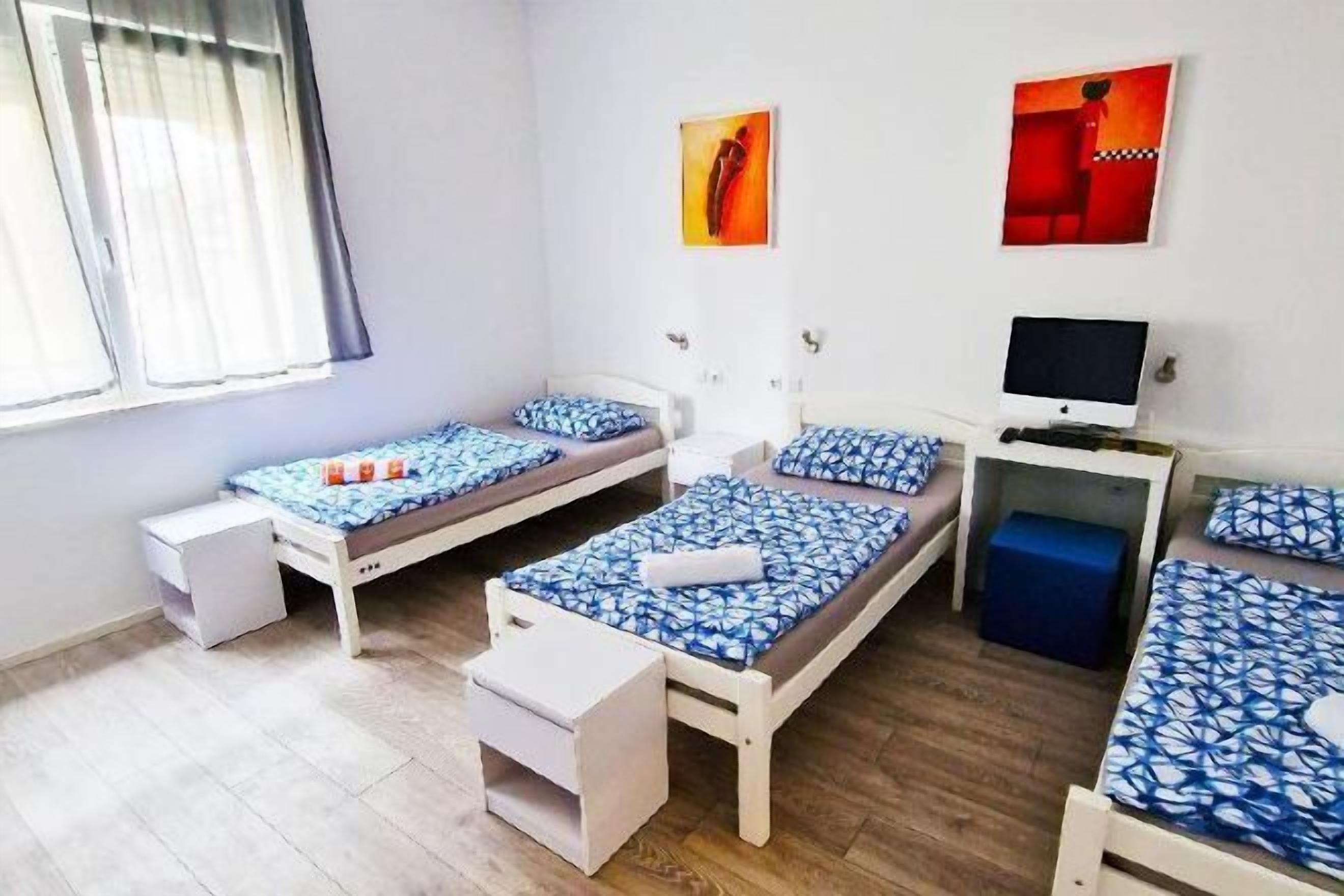 Desk, laptop workspace, free WiFi, bed sheets