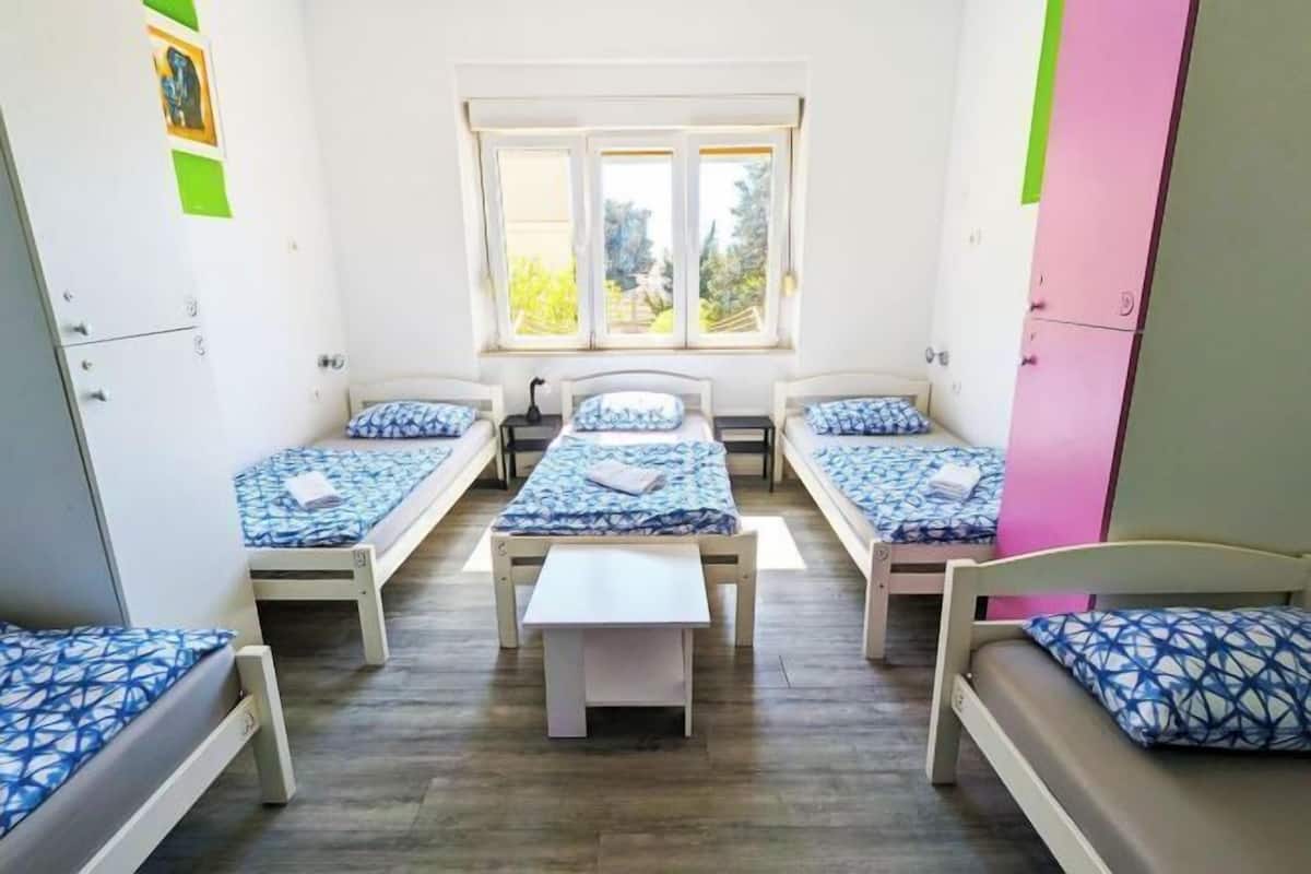 Desk, laptop workspace, free WiFi, bed sheets