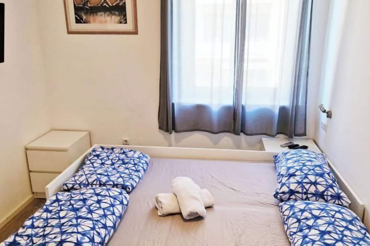 Desk, laptop workspace, free WiFi, bed sheets