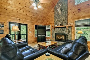 Smart TV, fireplace - Unleash adventure at Four Ridges! This pet-friendly haven offers a hot tub, firepit, WiFi, and doorstep hiking for boundless exploration (Cherry Log)