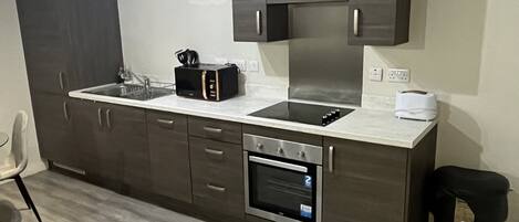 Apartamento, 2 camas Queen | Cozinha privada | Geladeira, micro-ondas, fogão, cooktop
