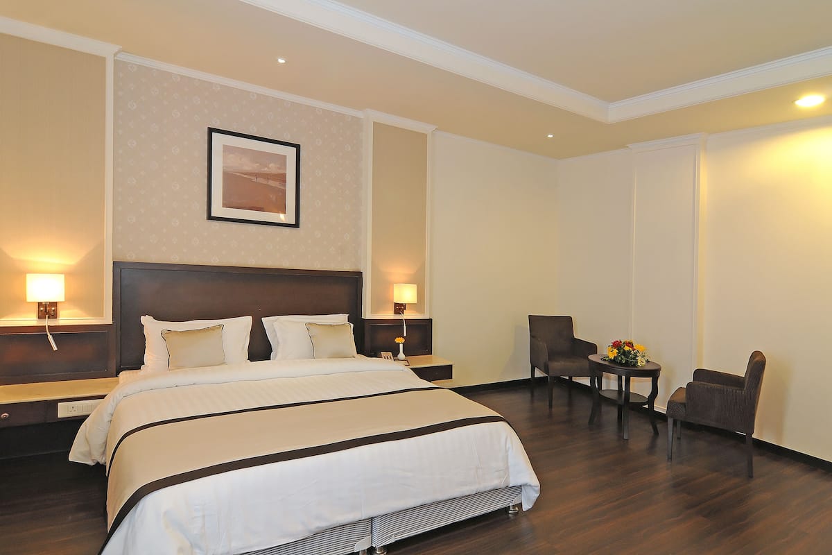 Chambre Double Deluxe, 1 trĂšs grand lit | 2 chambres, fer et planche Ă repasser, Wi-Fi gratuit, draps fournis