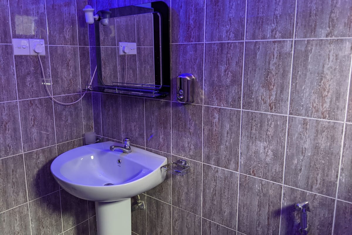 Shower, designer toiletries, hair dryer, bathrobes