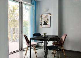 Family Room with Sea View and Two Rooms | Living room | Flat-screen TV, printers