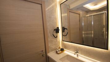 Shower, free toiletries, hair dryer, slippers