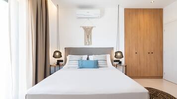 Suite, 2 Bedrooms, 2 Bathrooms, Sea View | Desk, soundproofing, iron/ironing board, free WiFi